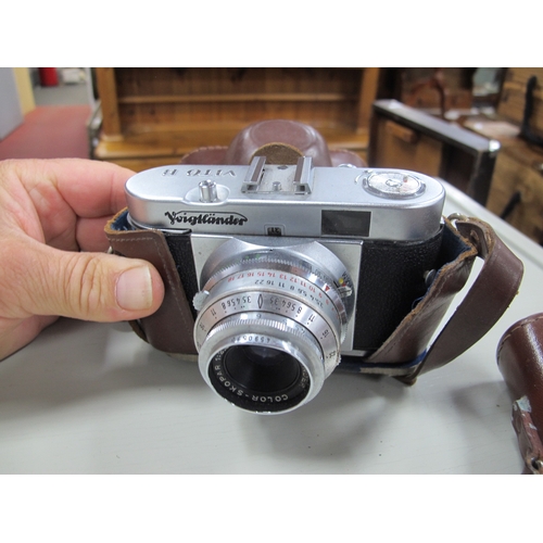 1144 - Cameras - including Vito B Nettar. lamps etc:- One Box. Magnon projector, Gnome rangefinder alpha de... 