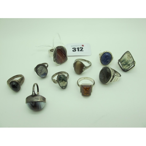 312 - A Collection of Assorted Single Stone Dress Rings, including 