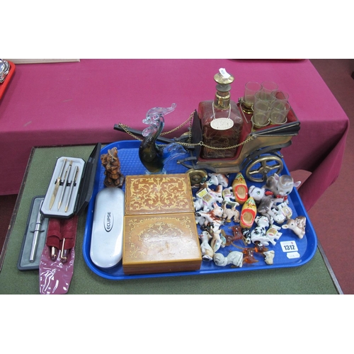 1312 - Whiskey Carriage, Wade and other figures, musical boxes, glass swan, writing implements.