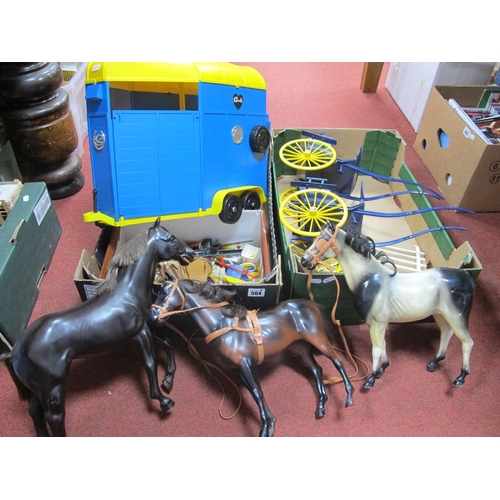 564 - A Collection of Sindy Accessories, by Pedigree to include horsebox, three horses, two gigs, saddle, ... 