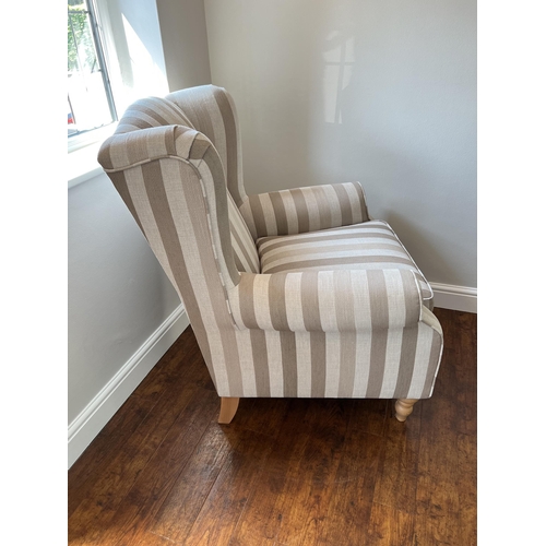 1525 - 'Next' Armchair, upholstered in openwork beige striped fabric, on turned forefront supports, (with f... 