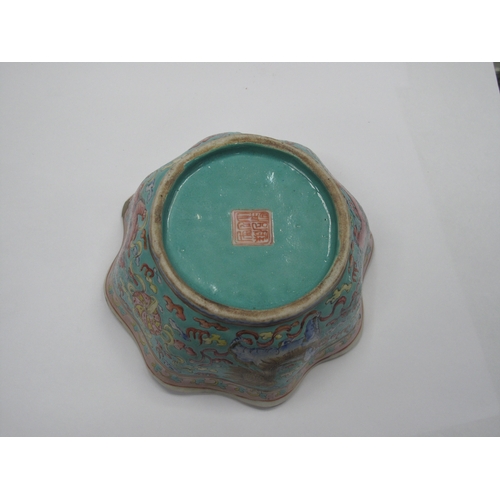 1326 - Oriental - Pottery bowl decorated with three temple lions on turquoise ground, with wavy rim, 14cm w... 