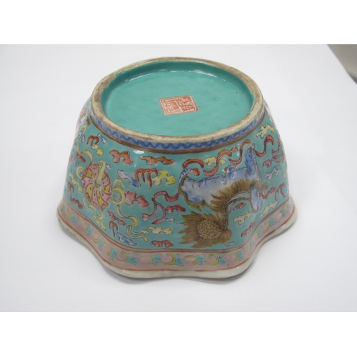 1326 - Oriental - Pottery bowl decorated with three temple lions on turquoise ground, with wavy rim, 14cm w... 