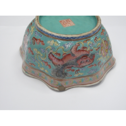 1326 - Oriental - Pottery bowl decorated with three temple lions on turquoise ground, with wavy rim, 14cm w... 