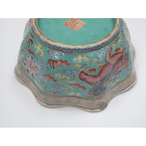 1326 - Oriental - Pottery bowl decorated with three temple lions on turquoise ground, with wavy rim, 14cm w... 