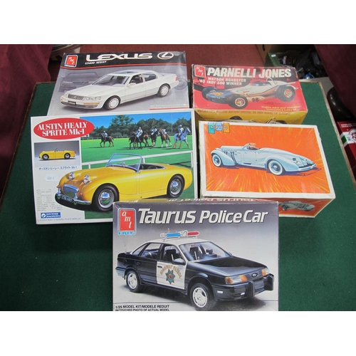 176 - Five Plastic Model Car Kits, by AMT, Pyro, Gunze Sangyo, to include AMT #T162 Parnelli Hones Watson ... 