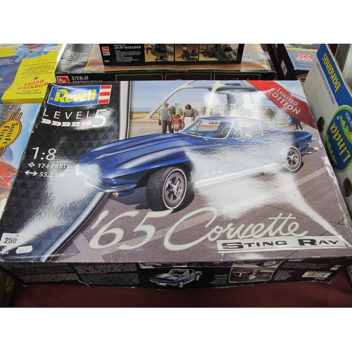 250 - A Revell #07434 1:8th Scale 65 Corvette Sting Ray Plastic Model Kit, bagged parts, accompanied by li... 