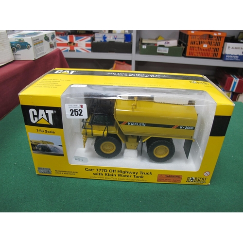 252 - A Norscot 1:50th Scale #55142 Diecast Model Cat 777D off Highway Truck, with Klein water tank, boxed... 