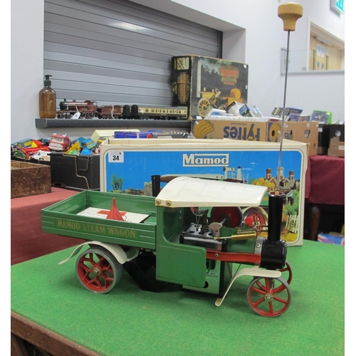 34 - A Boxed Mamod Live Steam S.W1 Steam Wagon, accessories include scuttle, burner, funnel steering rod,... 