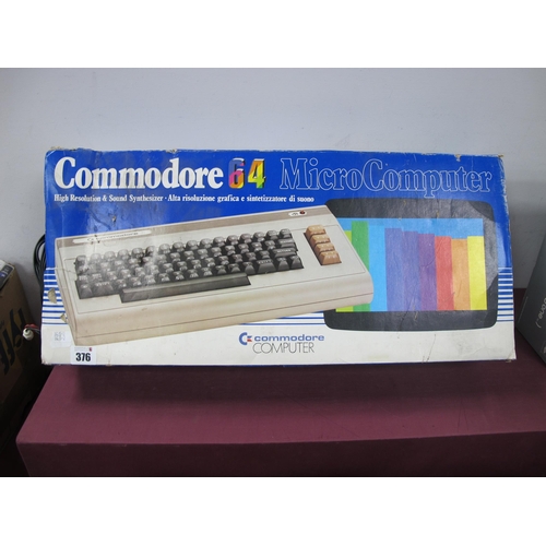 376 - Retro Technology:- A Boxed Commodore 64 Micro Computer, untested, some damage to packaging.