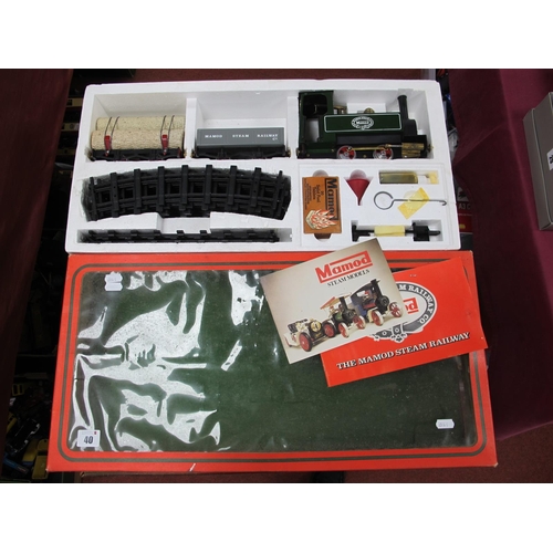 40 - A Mamod RS1 'O' Gauge Live Steam Goods Set, comprising of 0-4-0 locomotive, log wagon, open wagon, t... 