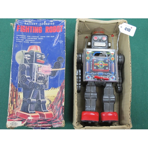 410 - A S.H (Horikawa) Japan Battery Operated Tinplate Fighting Robot, grey body, red feet, signs of play ... 