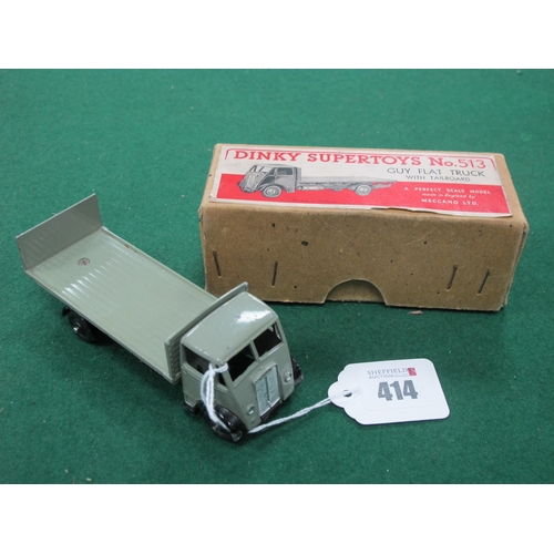 414 - A Dinky Supertoys No 513 Guy Flat Truck with Tailboard, grey cab, black chassis grey flat bed, multi... 