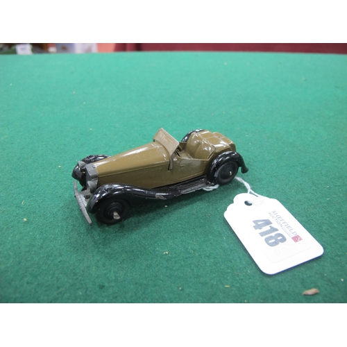 418 - A Dinky toys No 36E British Salmson Two Seater Sports Car, in brown with tinplate windscreen and bla... 