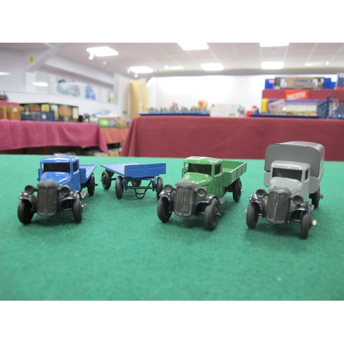 425 - Three Dinky Toys Diecast Model Commercial Vehicles, comprising of 25B covered wagon, light grey body... 