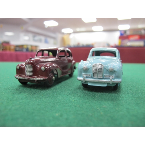 427 - Two Dinky Toys Diecast Model Cars, comprising of No 40D Austin (A40) Devon, maroon body and hubs, ch... 