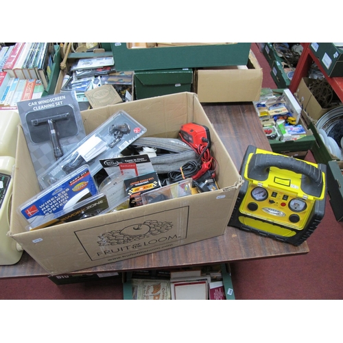 1064 - A Jumpstarter, with various boxed car maintenance and gadgets, reverse parking system, (untested sol... 