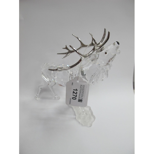 1270 - Swarovski Crystal Glass Stag, its two front feet on frosted base, 14cm high.
