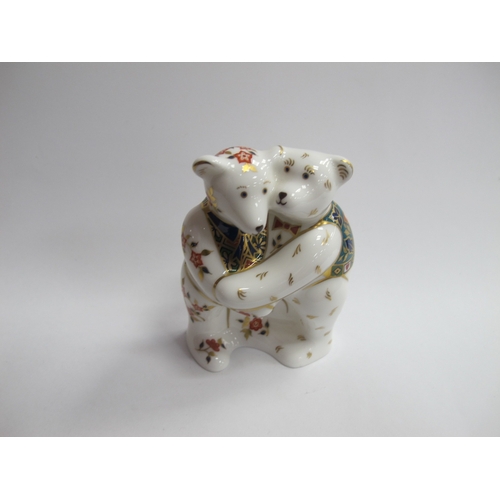1282 - Royal Crown Derby paperweight in the form of a pair of bears 'Bear Hug', first quality.