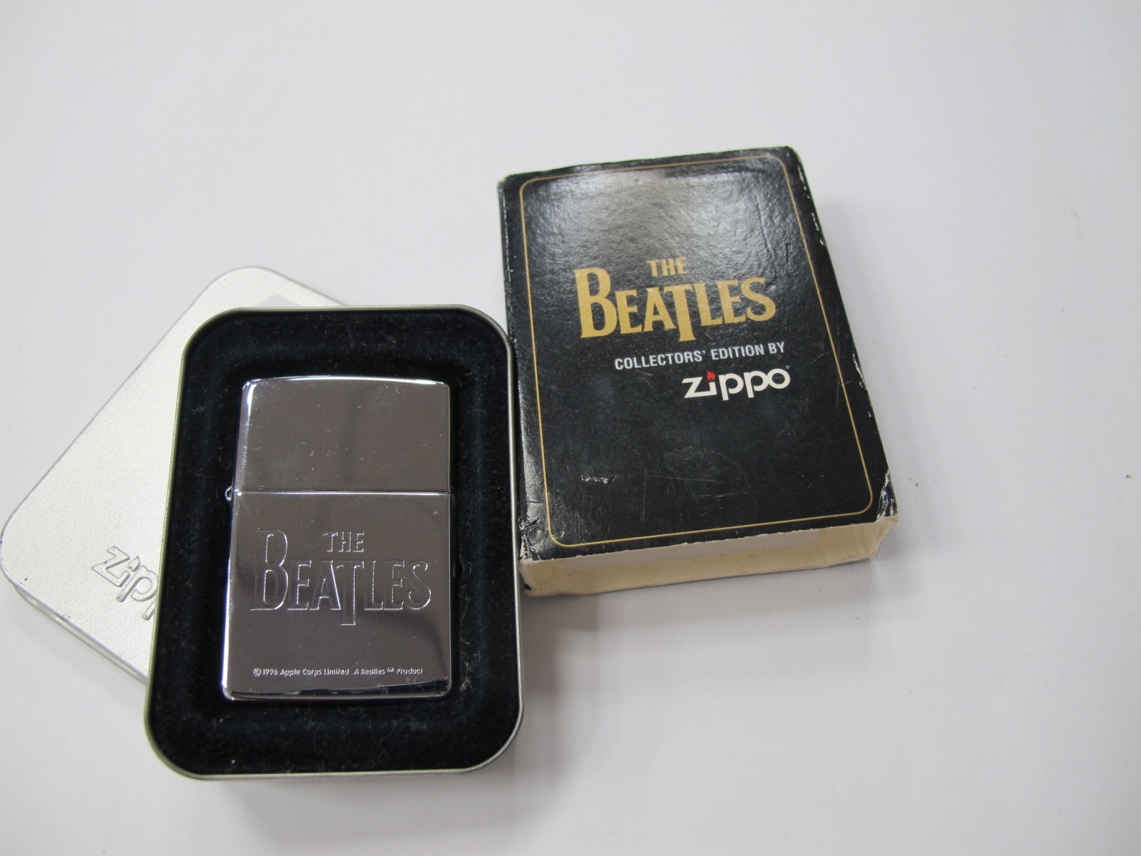 The Beatles Zippo lighter and box, from the the Apple Corp 1996 