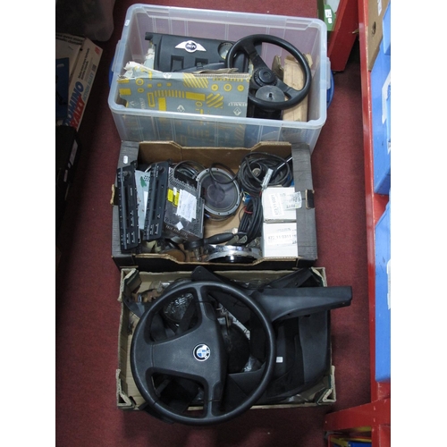 1040 - Three Boxes of Spare Car Parts, to include BMW business mini disc, BMW steering wheel, Land Rover mu... 