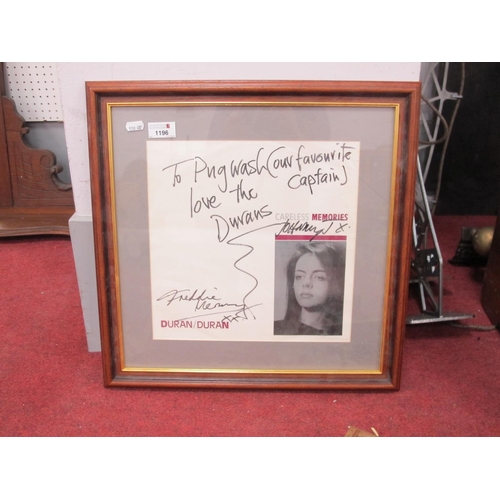 1196 - Framed Careless memories by Duran Duran bearing signatures 'Freddy Mercury' and 'John Taylor'. (Sign... 