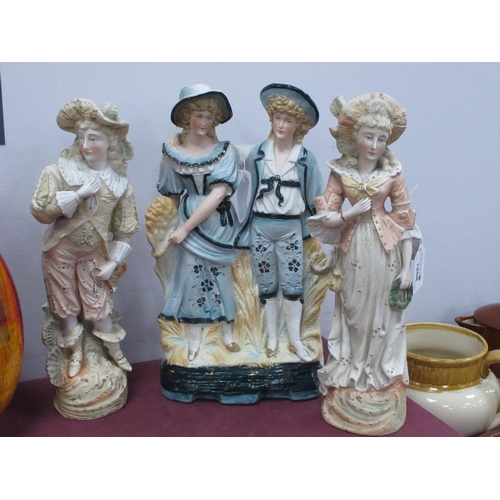 1208 - Pair of Late XIX Century Bisque Figures, of Regency couple 32cm high, a larger single group (3).