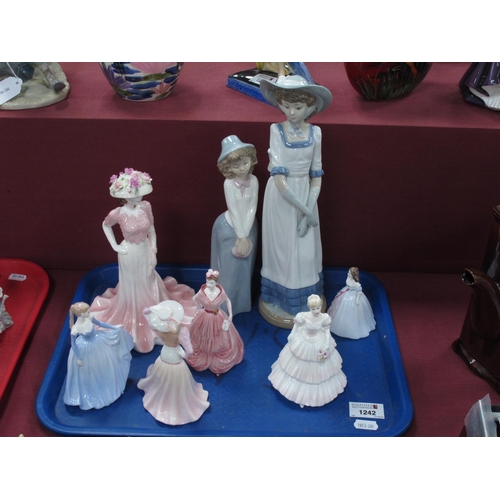 1242 - Two Nao Figures of Girls; together with six Coalport figurines of ladies.