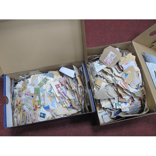 1051 - Two shoeboxes containing world stamps 'on paper', includes some earlier items from around 1940's onw... 