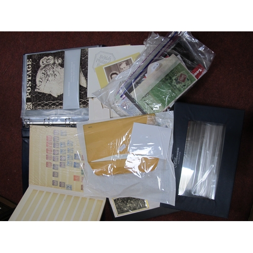 1058 - Stamps - An accumulation of Great Britain stamps in a stock book, loose in packets and presentation ... 