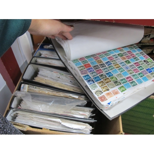 1083 - World stamps haphazardly mounted in ten albums plus a 'New Zealand stamp collection 1988' book and a... 