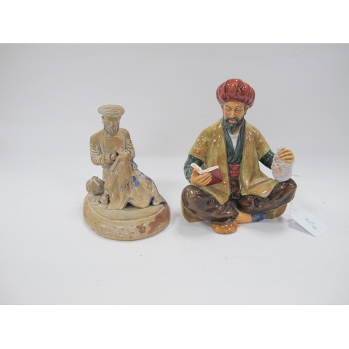 1193 - Royal Doulton Figure 'Omar Khayyam', HN 2247 (repaired). Terracotta figure of carpet maker, on an ov... 