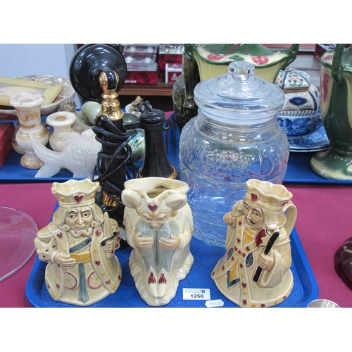 1256 - Plastic Candlestick Telephone, Italian glass jar, three H J Wood character jugs:- One Tray.