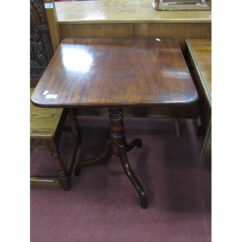 1549 - XIX Century Mahogany Pedestal Table, with a rectangular top, turned pedestal on shaped supports.