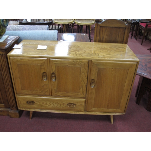 1560 - Ercol Golden Beech & Elm Sideboard, with two cupboard doors over single drawer, with larger door to ... 