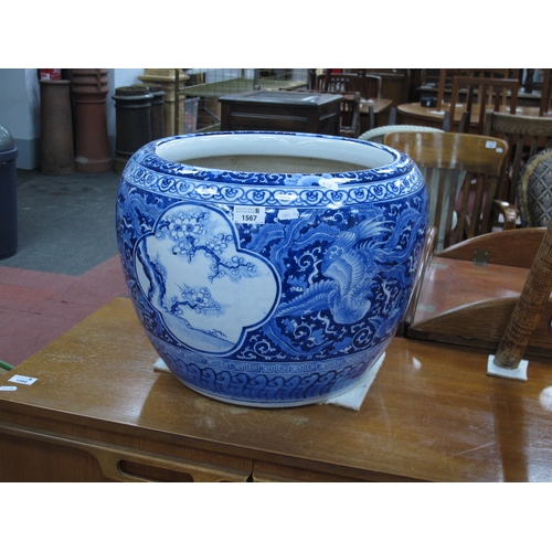 1567 - Oriental, large blue and white pottery, jardiniere, heavily decorated with exotic birds, prunus blos... 