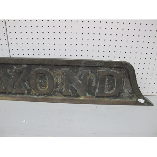 613 - An early 20th century cast railway sign, 'Glenalmond', 128cm across.