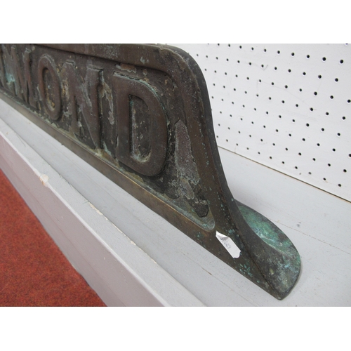 613 - An early 20th century cast railway sign, 'Glenalmond', 128cm across.