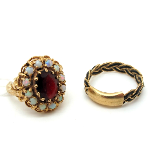 145 - A 9ct Gold Opal and Garnet Cluster Ring, claw set to the centre (finger size I); together with a wov... 