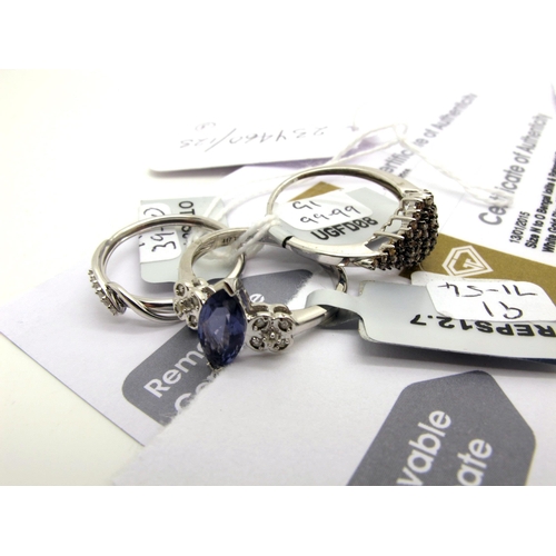 167 - The Genuine Gemstone Company Ltd; A 9ct White Gold Cognac Diamond Cluster Ring, allover claw set sto... 