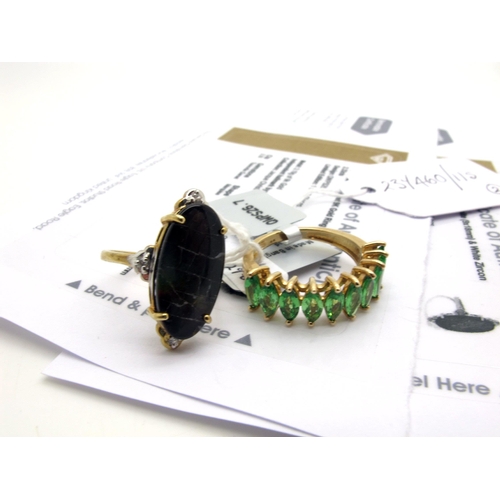 170 - The Genuine Gemstone Company Ltd; A 9 ct Gold Tsavorite Garnet Dress Ring, claw set marquise cut sto... 