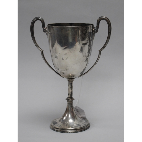 27 - A Hallmarked Silver Twin Handled Trophy Cup, Mappin & Webb, Sheffield 1898, on circular spreading ba... 