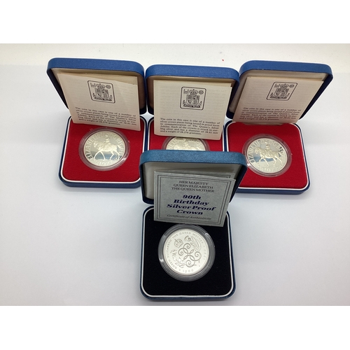 101A - Four Royal Mint Silver Proof Crowns, three 1977 Queen's Silver Jubilee and a Queen Mother 90th Birth... 