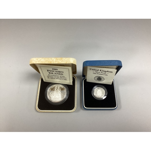 102 - Royal Mint 1989 Pitcairn Islands Silver Proof $1 Coin, together with a 1988 Royal Mint silver proof ... 