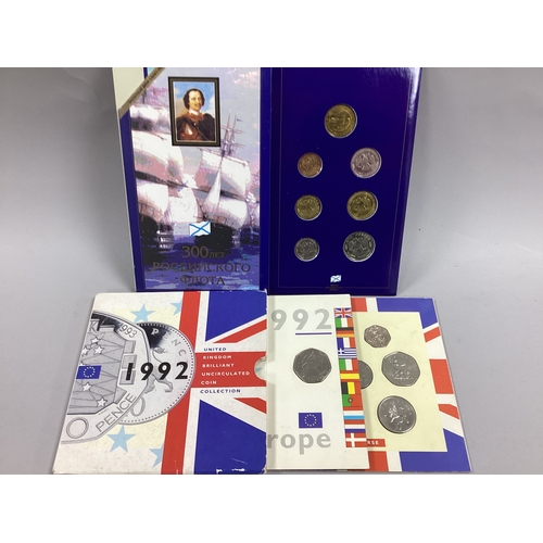 73 - Royal Mint 1992 Bunc Coin Set, features the dual dated EEC 50p coin, together with a 1996 Russia 300... 