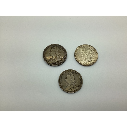 84A - Three Silver Coins, including a 1900 Victoria Crown, an 1890 Victoria Double Florin and a 1926 Liber... 