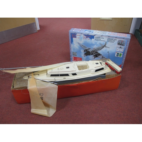 325 - A Plastic R/C Pond Yacht, requiring attention although the hull and superstructure appear sound. A 6... 