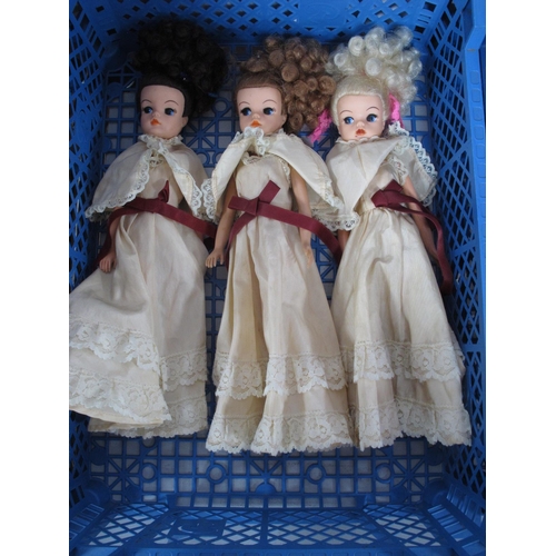 359 - Three circa 1980's Sindy Dolls each marked to back of head 033055X and clothed in evening gowns with... 