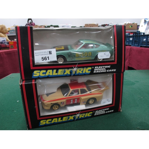 561 - Two Boxed Scalextric slot cars comprising of C.380 Datsun 260Z Bison Computers (damage to rear bumpe... 