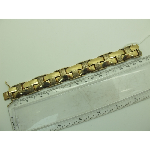 100 - A 9ct Gold Chunky Bracelet, of geometric design, to snap clasp (39grams).